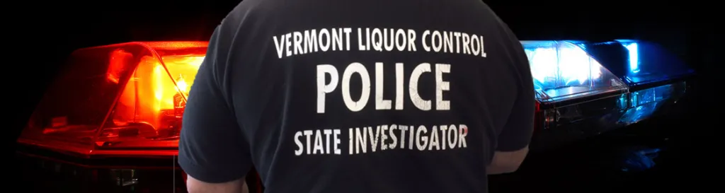 Man in a shirt that says "Vermont Liquor Control Police State Investigator"